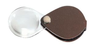 Folding magnifier in brown leather case